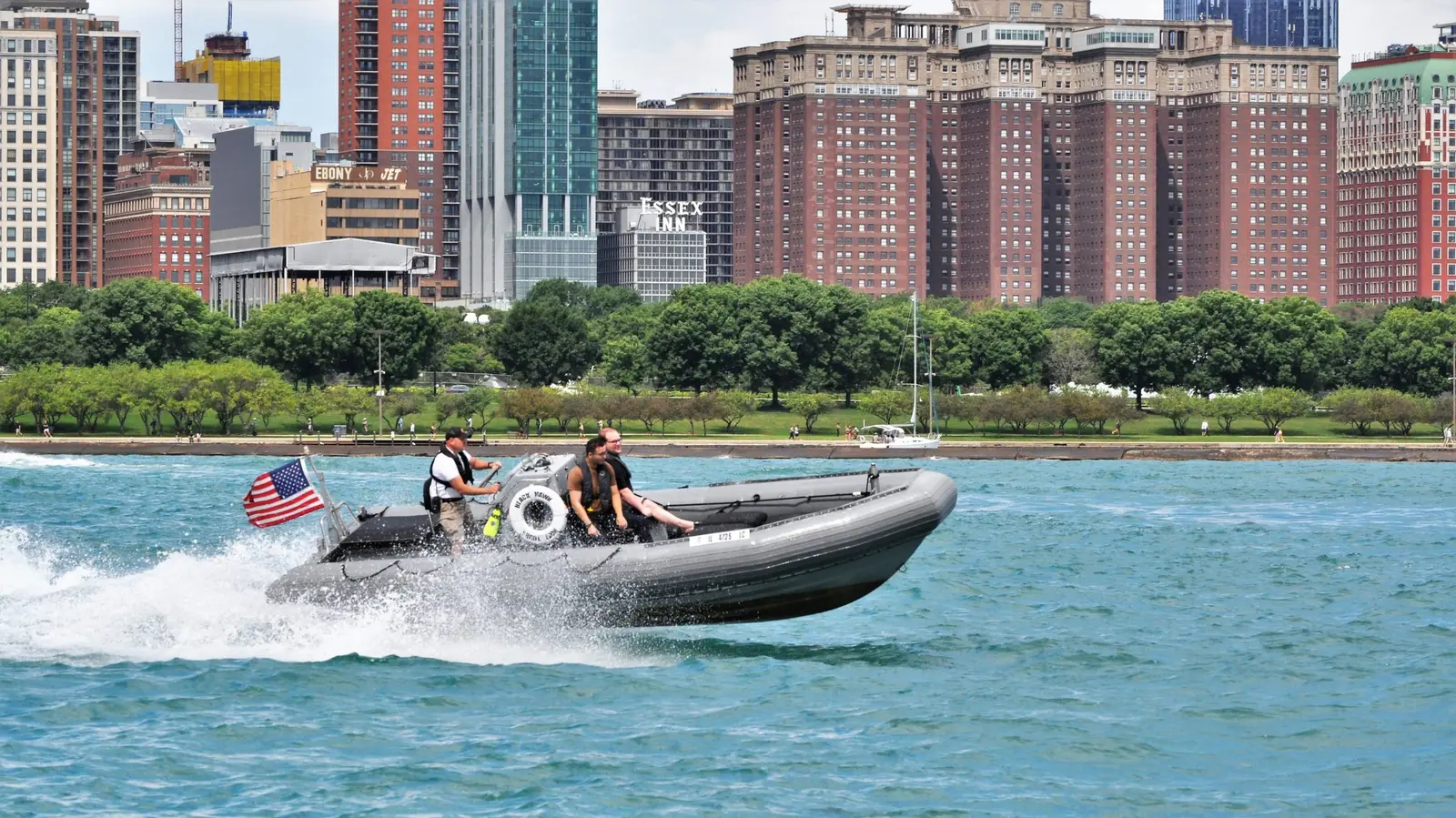 Blackhawk RHIB speeding past Navy Pier, Chicago skyline behind